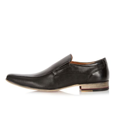 Black perforated slip on shoes